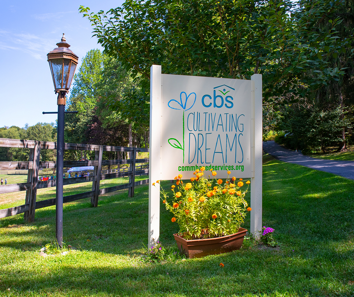 Community Based Services and Cultivating Dreams sign