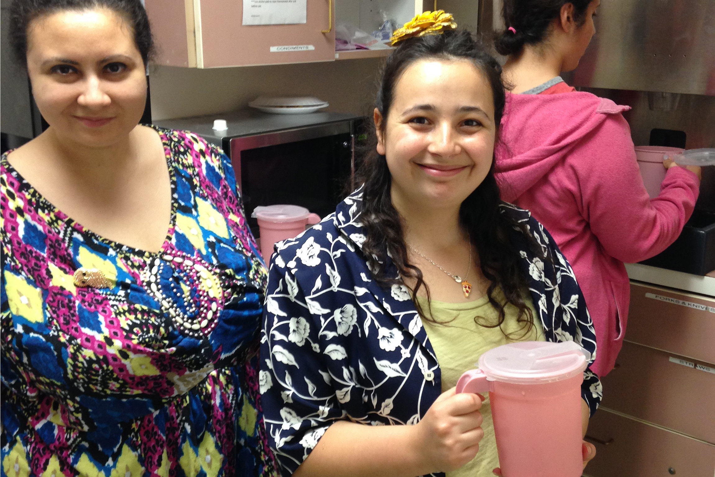 Individuals with disabilities prepare drinks in the Life Skills Center kitchen.